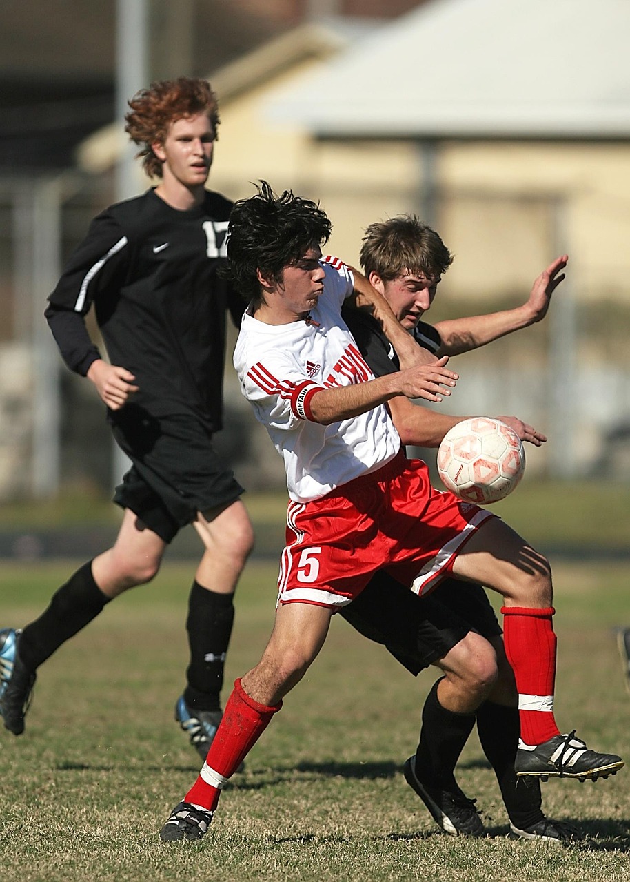 soccer, football, sport, ball, game, player, grass, field, competition, action, team, kick, school, football game, football team, soccer team, active, nature, kicking, soccer ball, sports balls, youth, young, athlete, match
